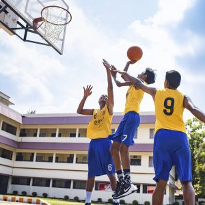 Students playing Basketball at Don Bosco Senior Secondary School Vaduthala